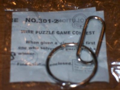 Wire Metal Puzzle Game Magic Trick Toy Party Gag Gift  